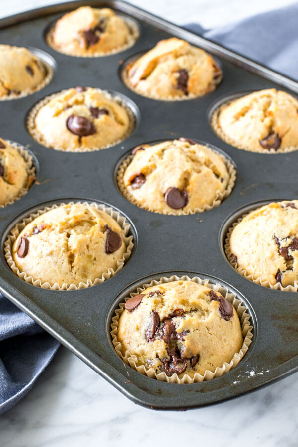 A pan of banana chocolate chip muffins fresh out of the oven. 
