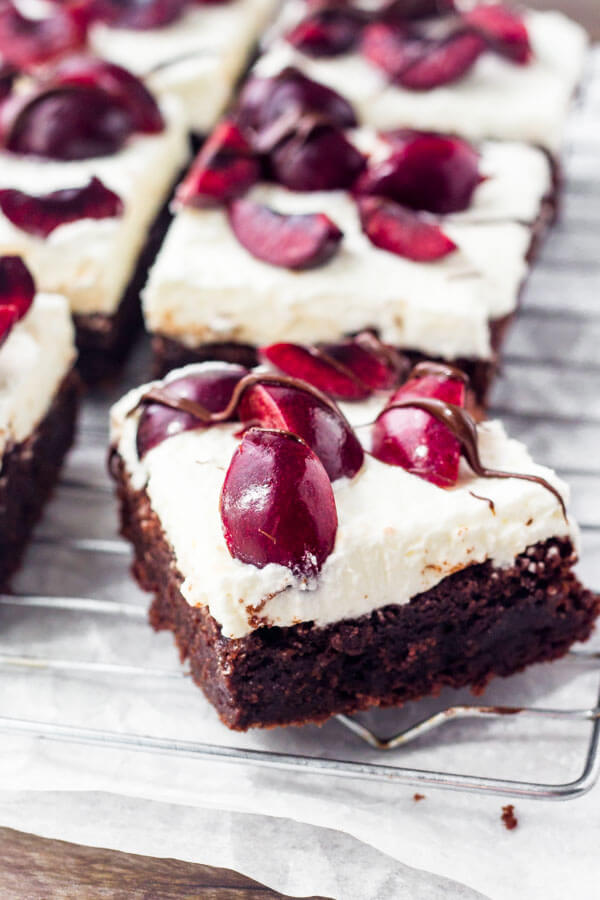 Forget black forest cake - make black forest brownies instead. So fudgy and topped with fresh cherries. 