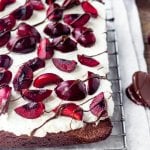 If you love black forest cake - then try these black forest brownies. Extra fudgy brownie topped with sweetened whipped cream & fresh cherries. They're the perfect way to celebrate cherry season. 