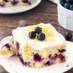 This lemon blueberry cake starts with a moist & tender lemon cake that's dotted with juicy blueberries. Then it's topped with cream cheese frosting that has just a hint of l