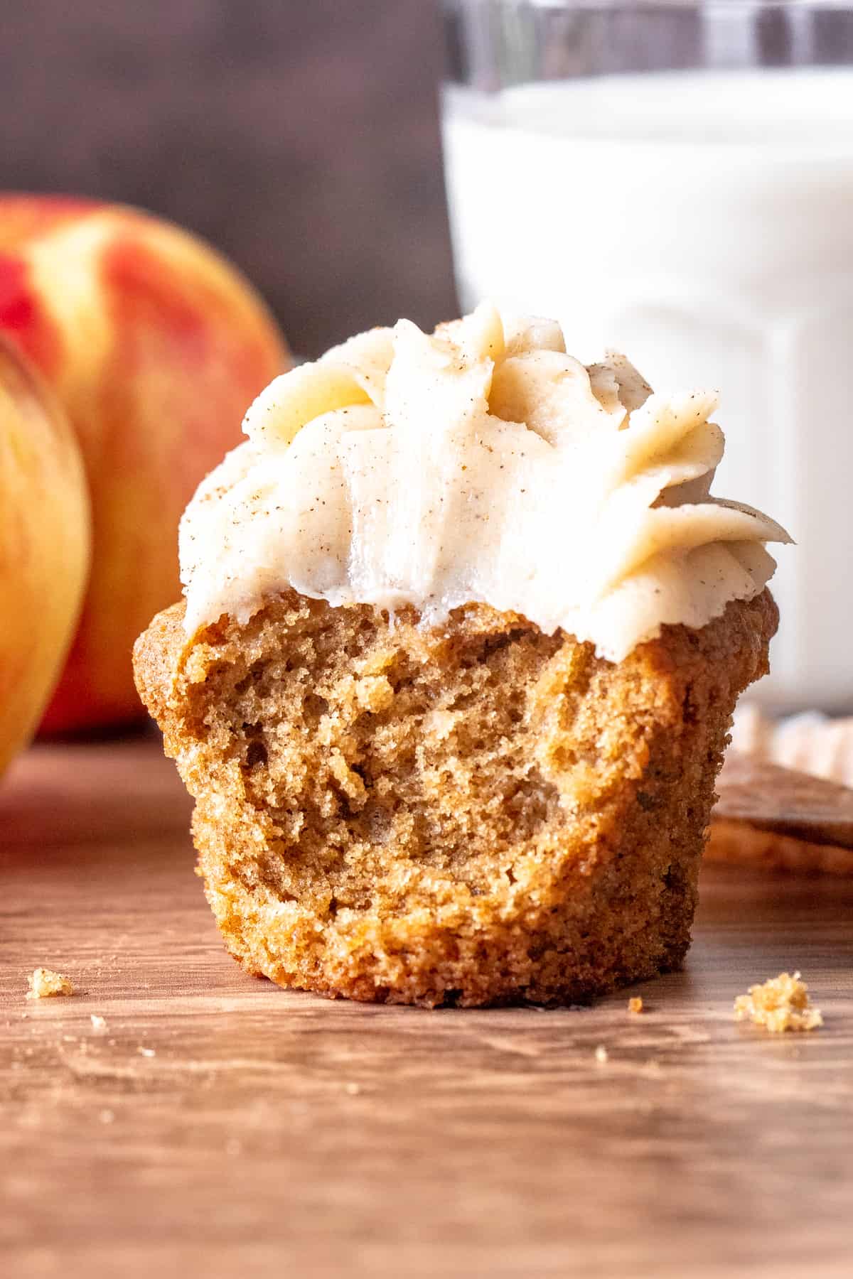 Apple spice cupcake with a bite taken out