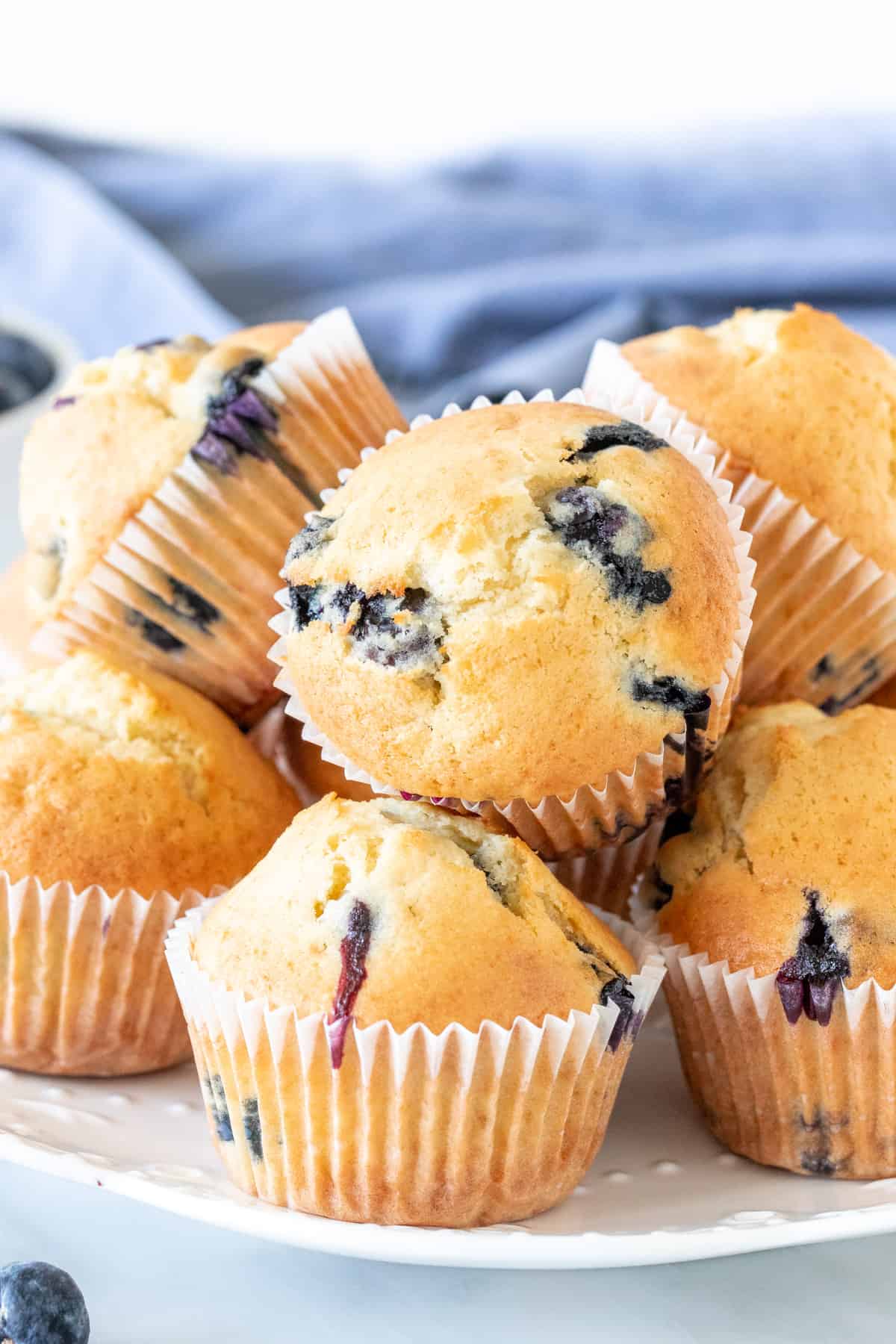Plate of sour cream blueberry muffins
