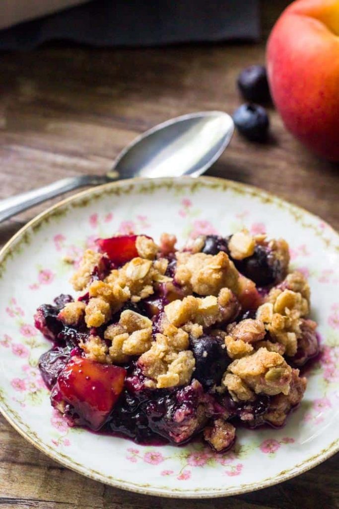 This blueberry peach crumble is the filled with delicious summer fruit with delicious crumble topping.