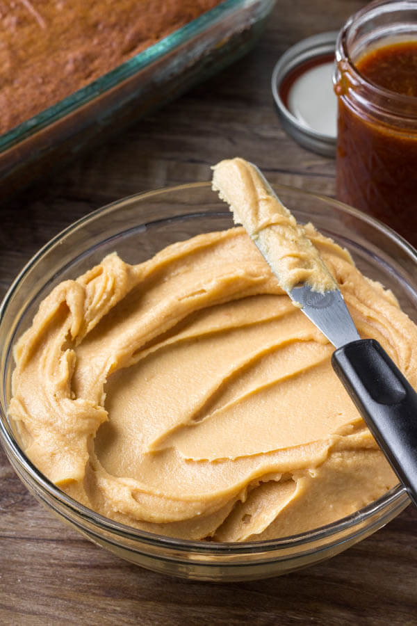 A bowl of caramel cream cheese frosting - smooth, creamy, perfectly sweet. 