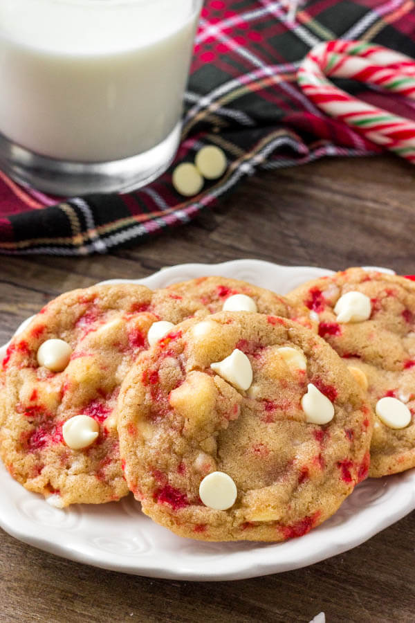 These white chocolate candy cane cookies are the perfect holiday chocolate chip cookie recipe. They're soft, chewy, filled with Christmas cheer & super pretty! 