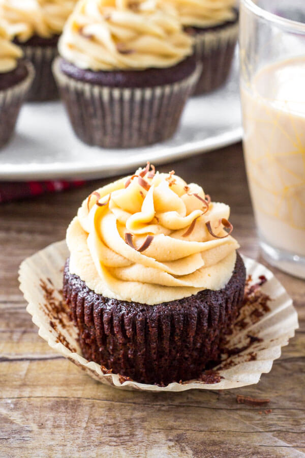 Baileys Cupcakes are the perfect grown-up cupcake recipe - moist, fudgy chocolate cupcakes with fluffy Irish cream frosting and completely irresistible.