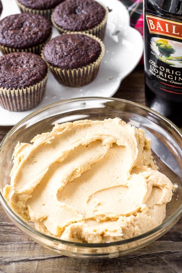 A bowl of Baileys frosting for making Irish cream cupcakes