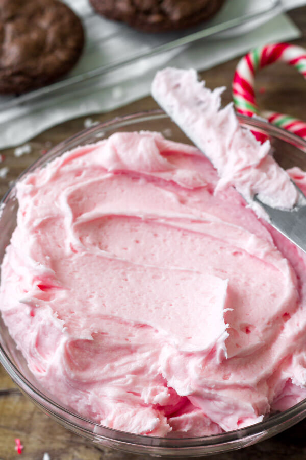 Creamy candy cane frosting for making chocolate peppermint sandwich cookies