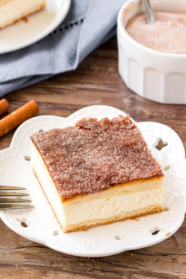 Sopapilla cheesecake recipe - cheesecake between 2 layers of crescent rolls & topped with cinnamon sugar. 