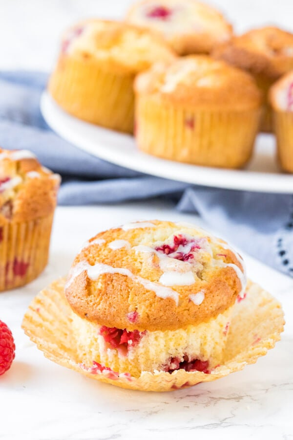 Homemade raspberry muffins are fluffy, moist and filled with sweet, juicy berries. 