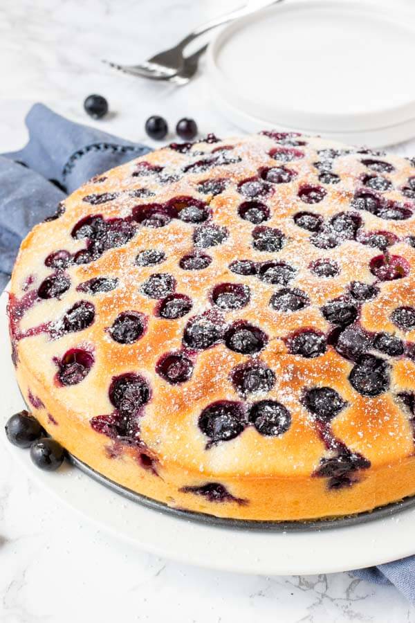 Moist blueberry cake with tons of blueberries on top and in the middle with just a hint of lemon. 