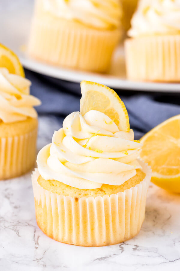 homemade lemon cupcakes are fluffy, moist and topped with lemon buttercream frosting. The citrus flavor is the perfect balance of sweet and tangy, and perfect for true lemon lovers. 