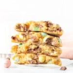 Stack of mini egg cookies, broken in half