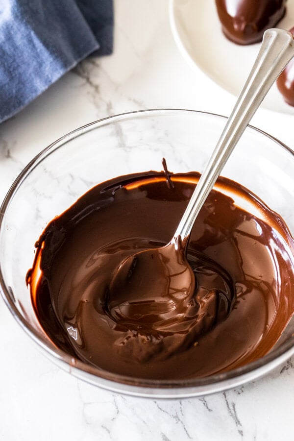 Melted chocolate in a glass bowl