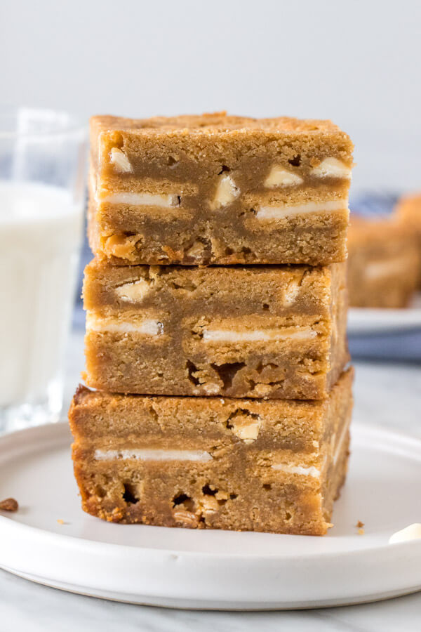 A stack of 3 golden Oreo stuffed blondies.