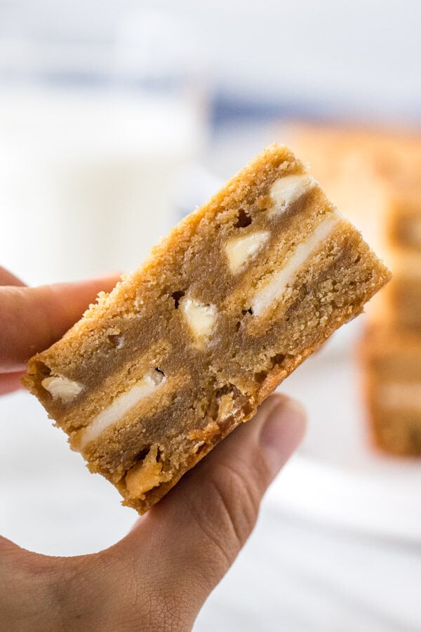 A golden Oreo stuffed blondie from the side. 