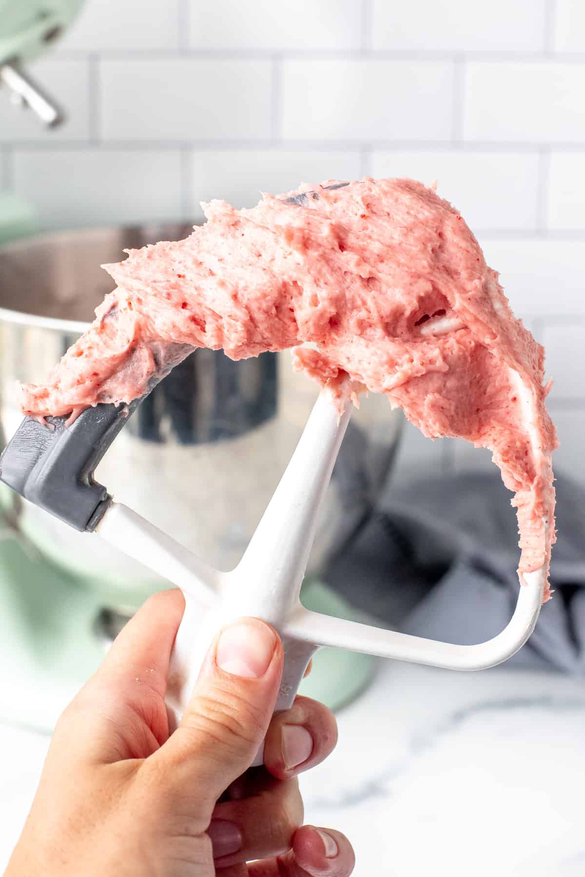 Strawberry frosting on electric beater