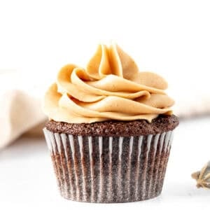 Chocolate cupcakes piped with peanut butter frosting