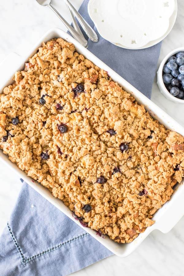 9x13 inch pan of blueberry french toast casserole with cinnamon streusel topping. 