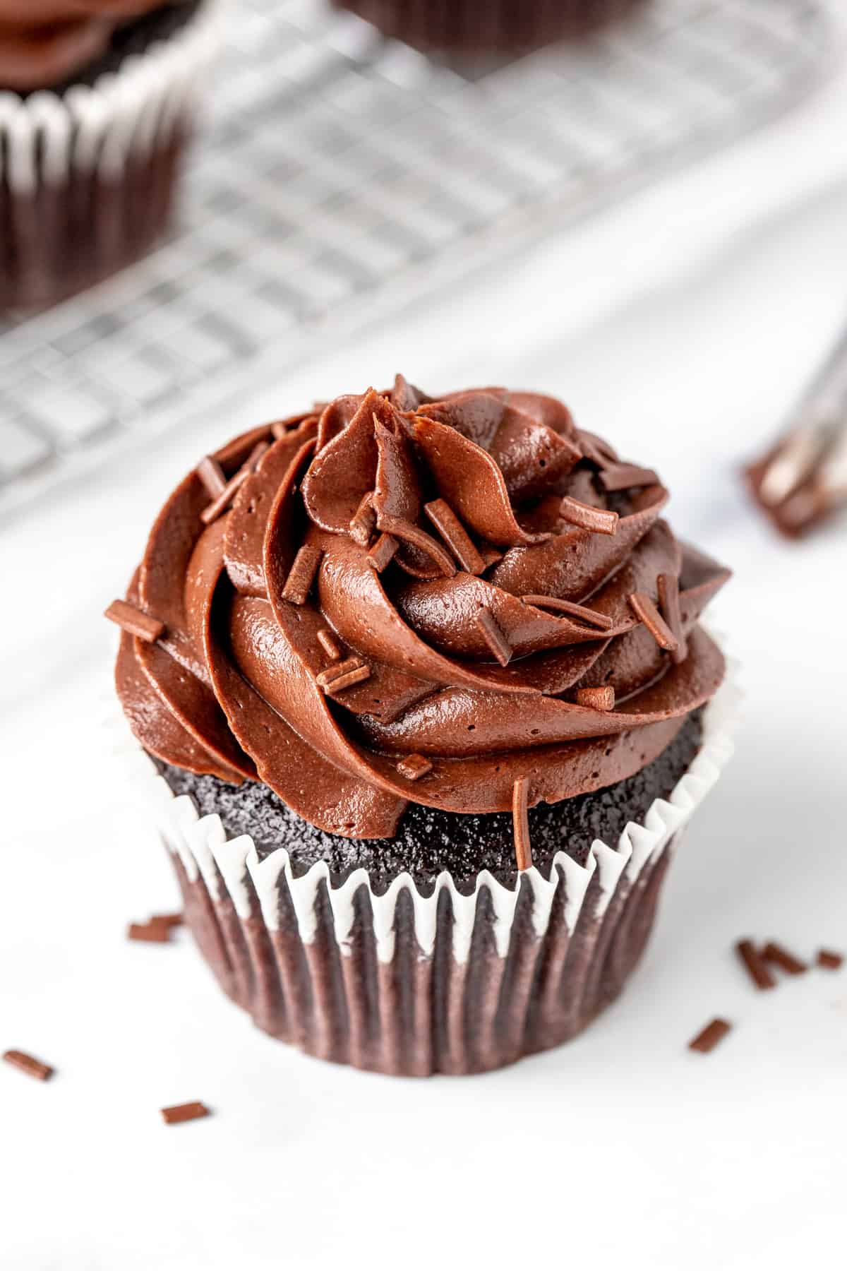 Chocolate cupcake decorated with chocolate buttercream frosting