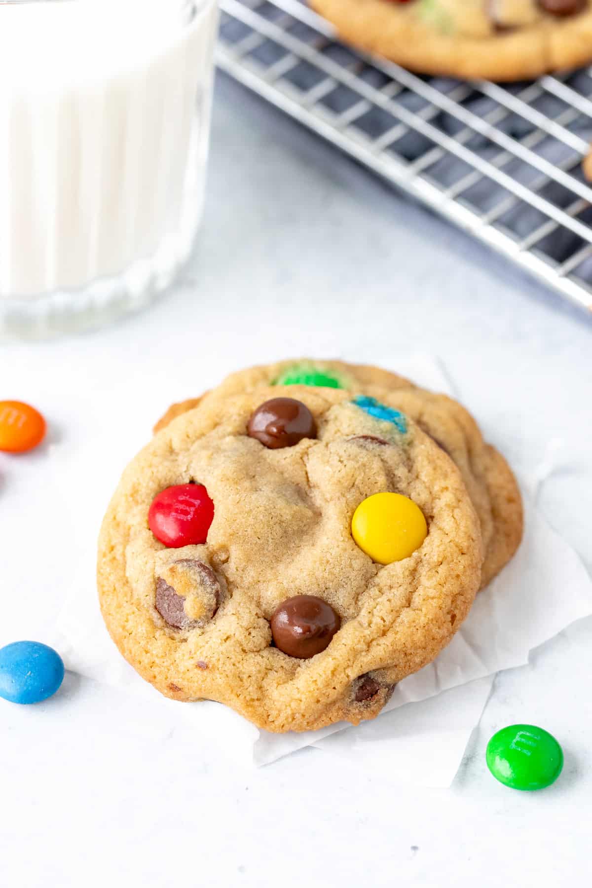 2 M&M cookies with glass of milk