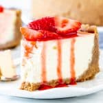 Slice of strawberry cheesecake on a plate