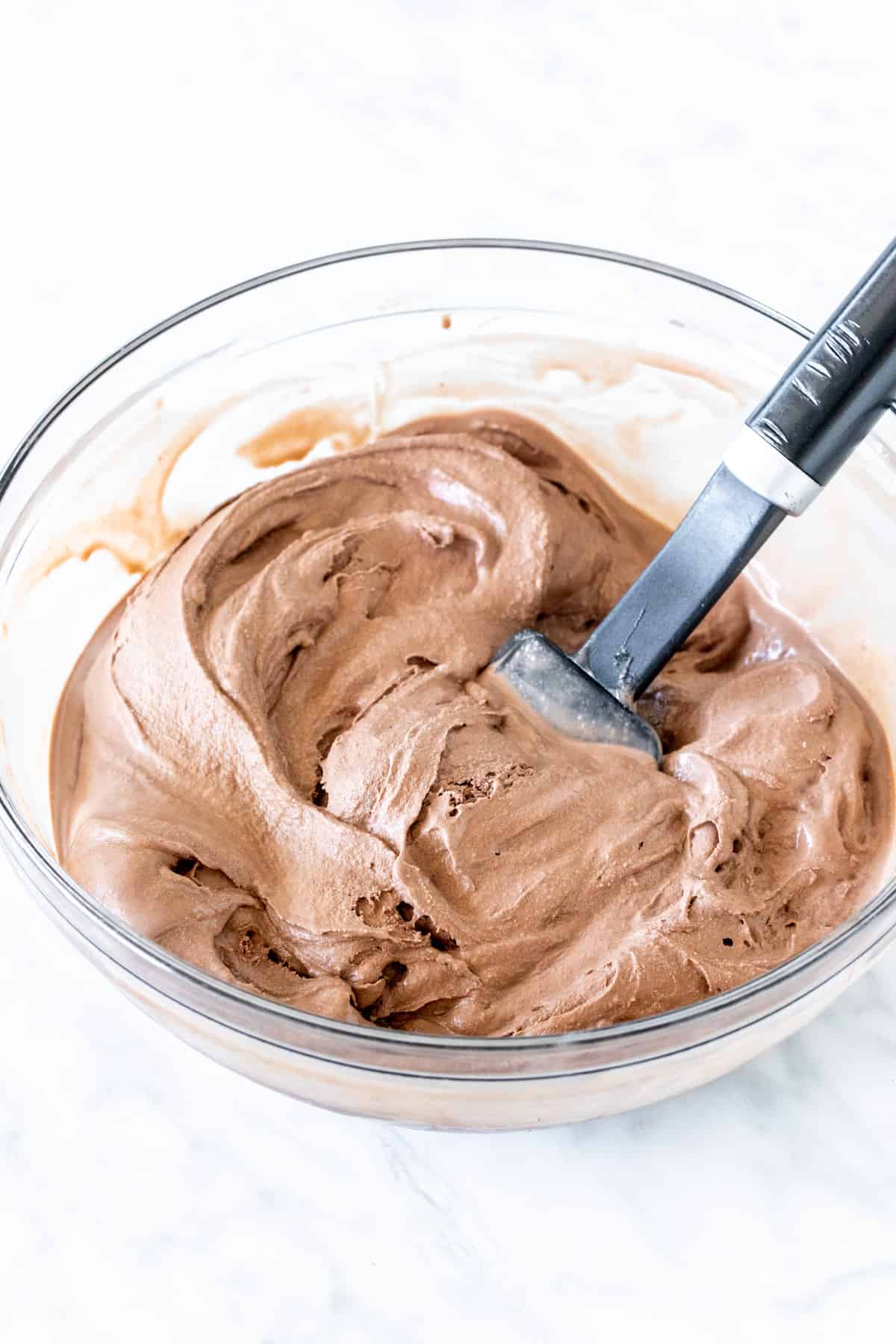 Bowl of softened chocolate ice cream