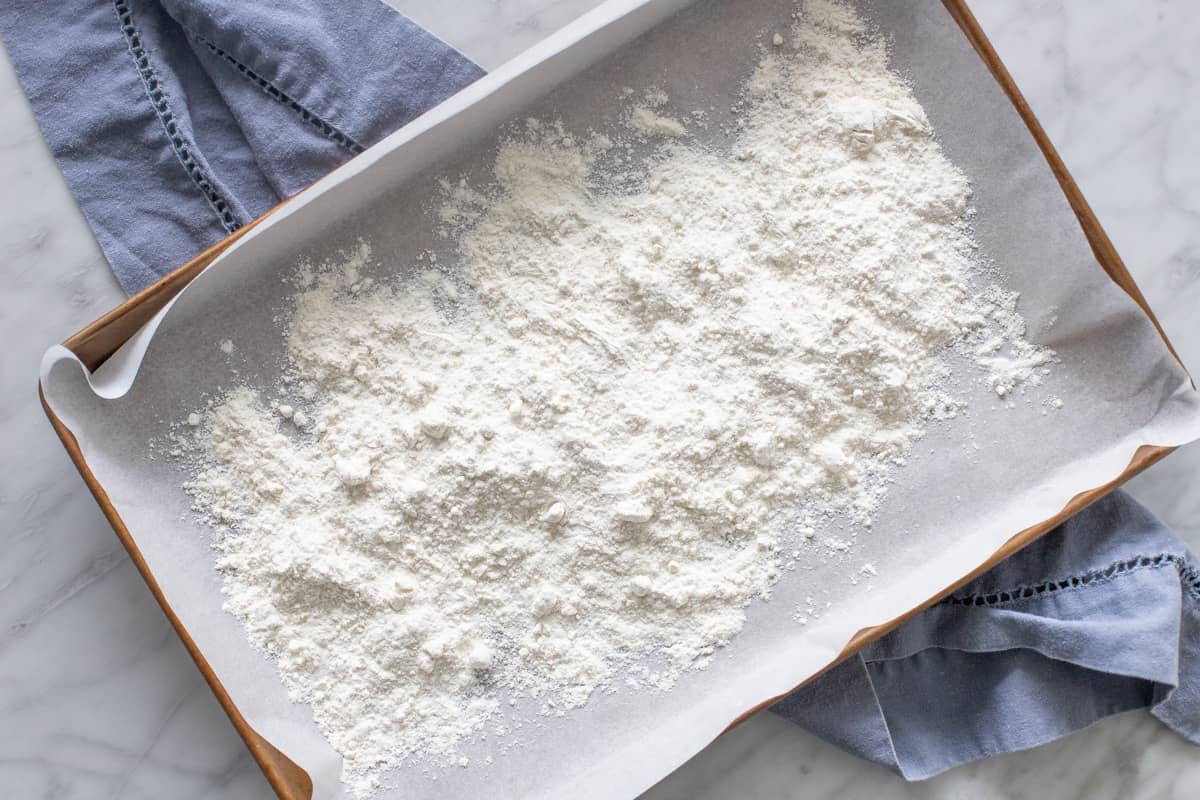 Flour on a lined cookie sheet