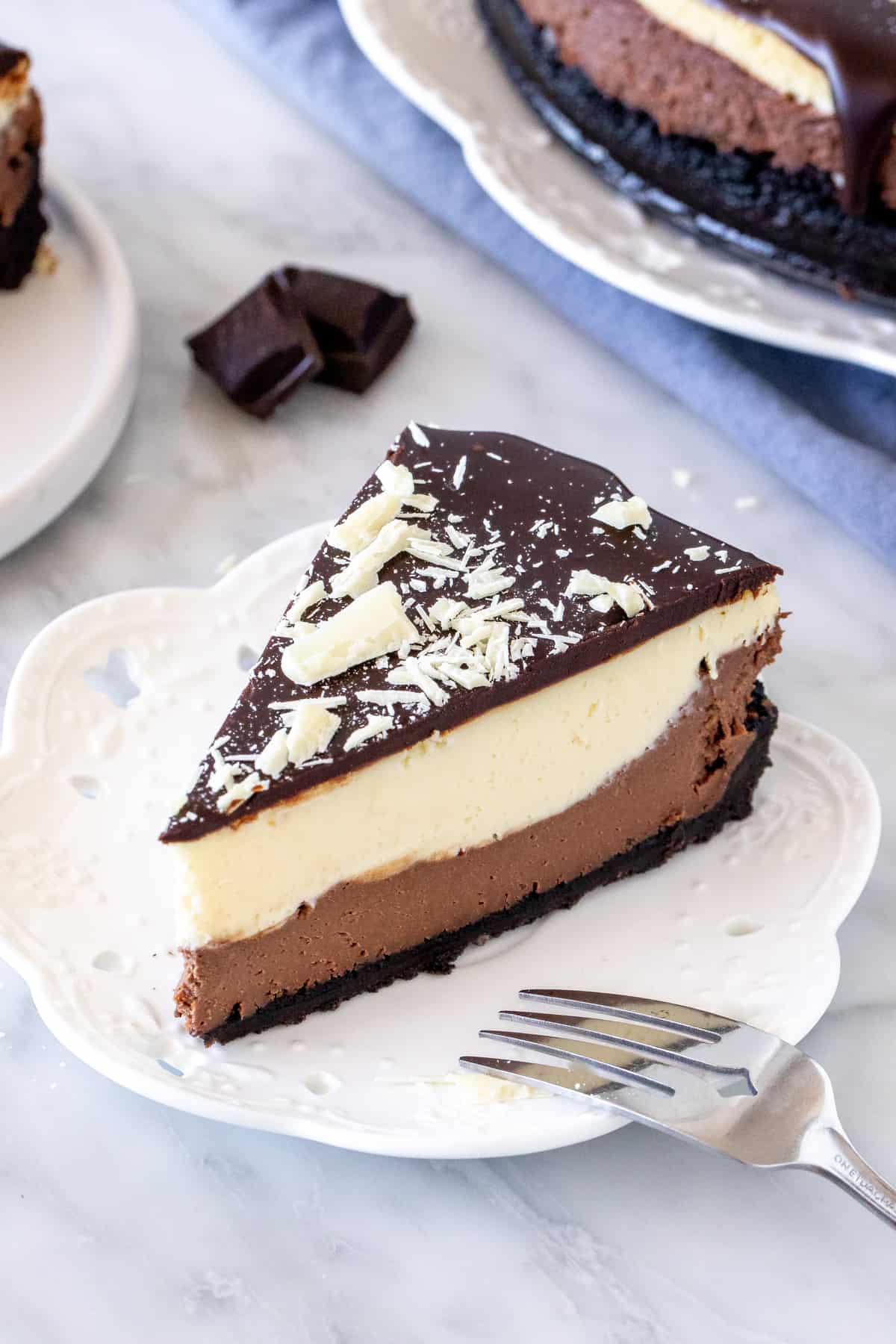 Slice of layered chocolate cheesecake