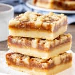 3 caramel crumb bars, stacked one on top of each other