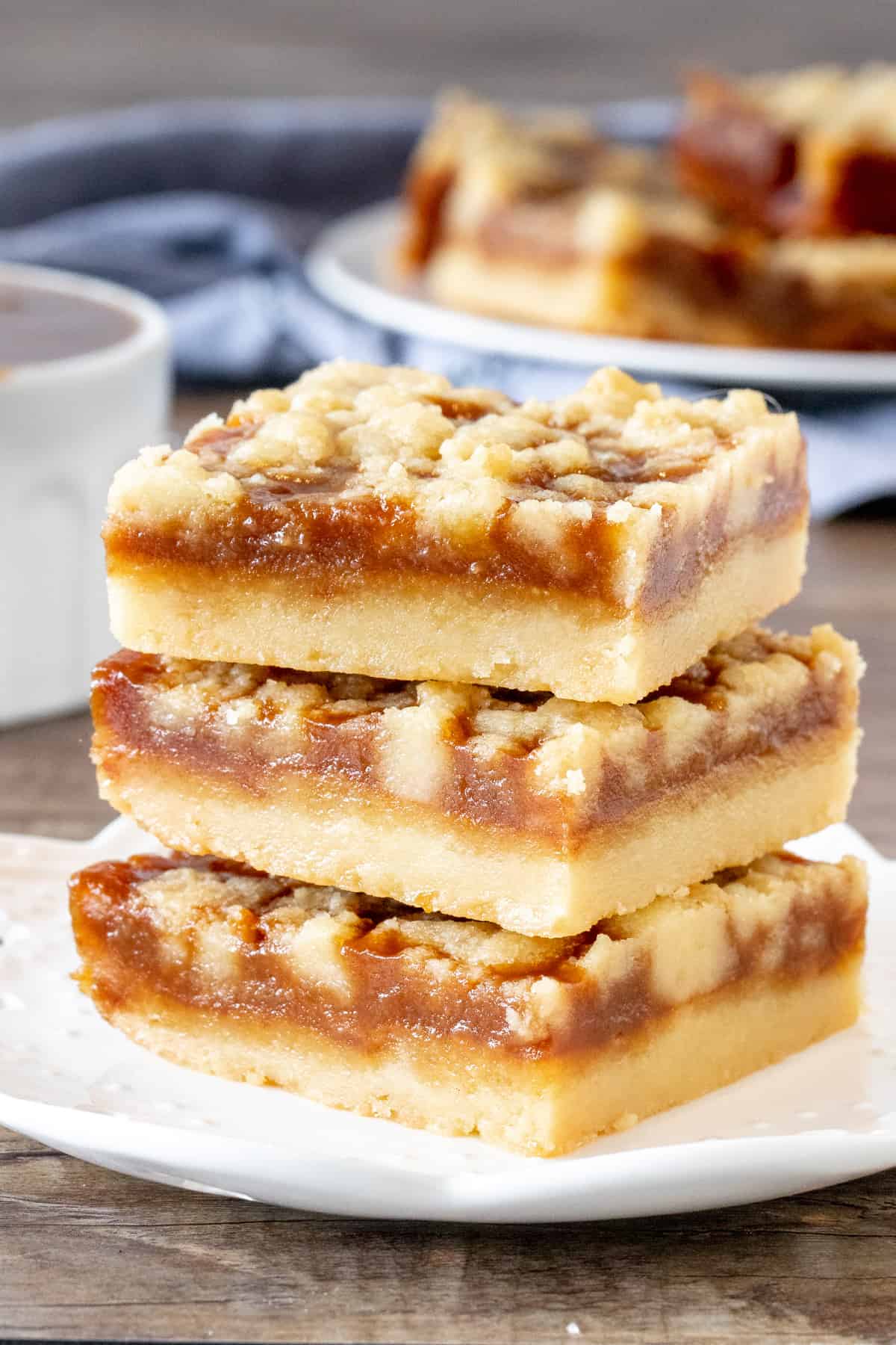 3 caramel crumb bars, stacked one on top of each other