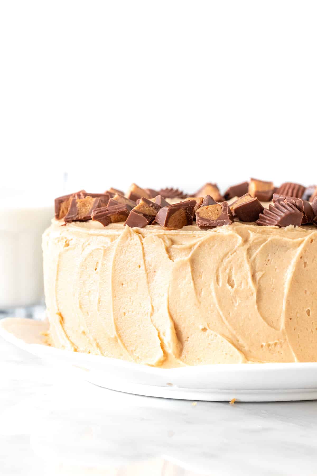 8-inch round peanut butter layer cake, topped with peanut butter cups.