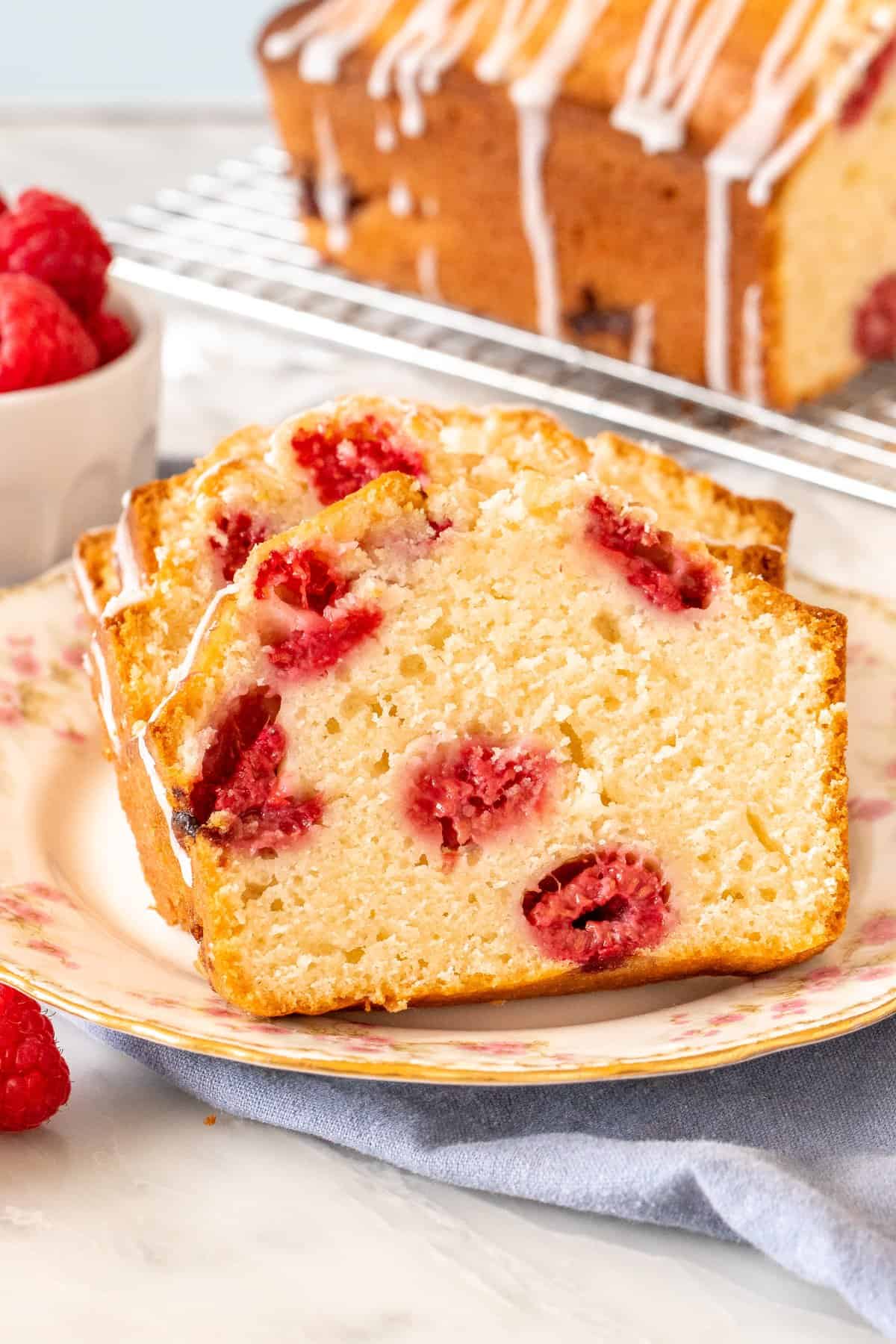 Slices of moist raspberry bread on a plate