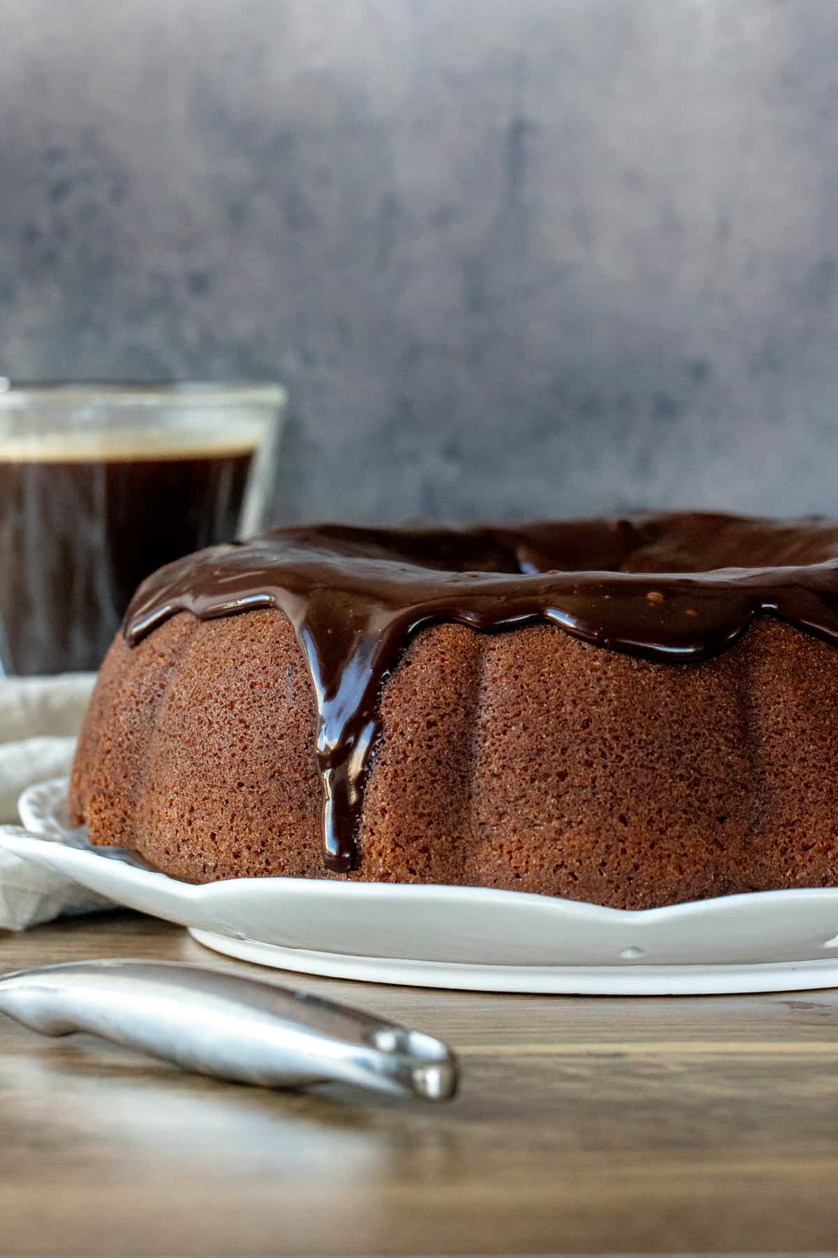 Coffee flavored bundt cake topped with chocolate ganache