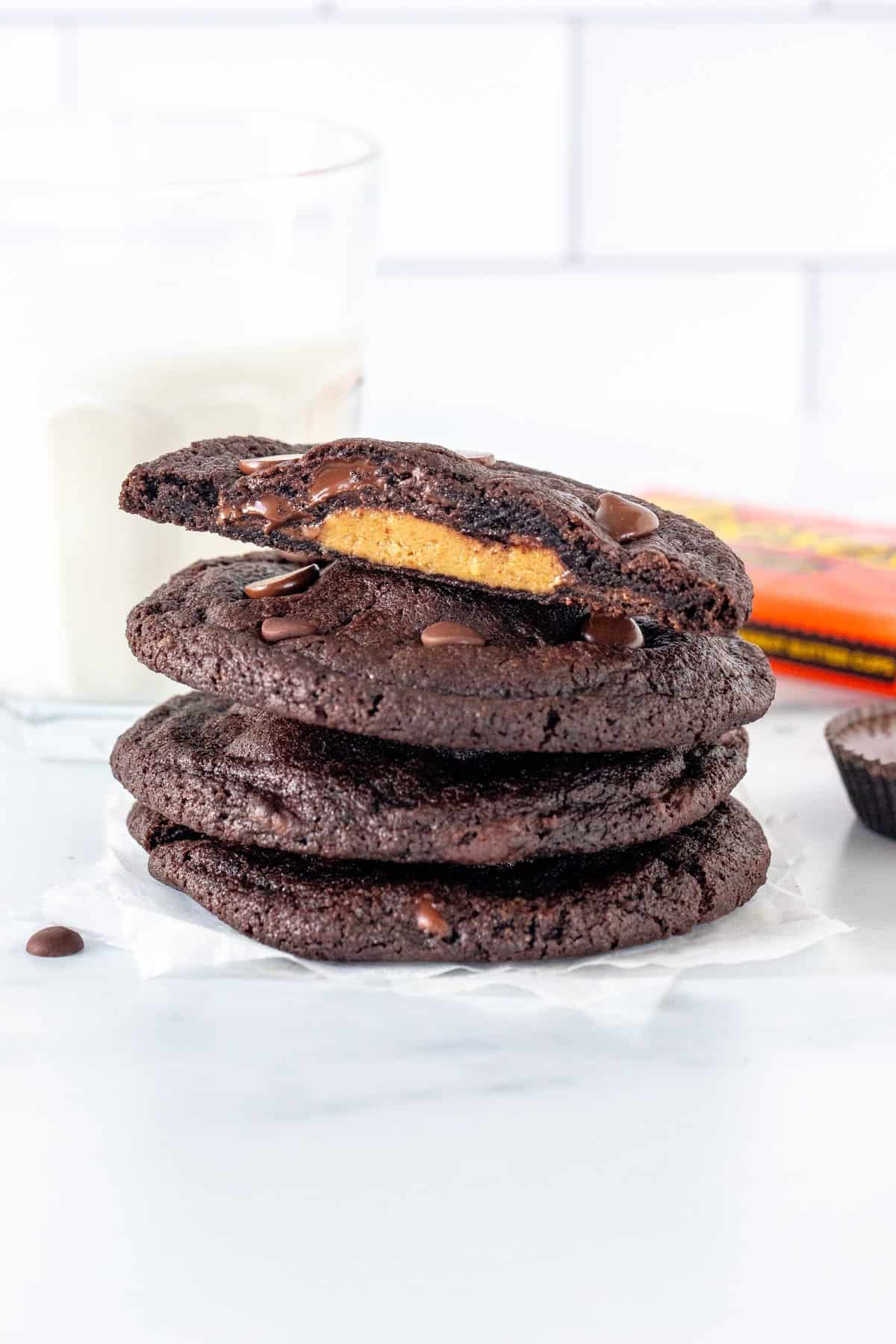 Stack of Reese's double chocolate cookies, with top cookie broken in half
