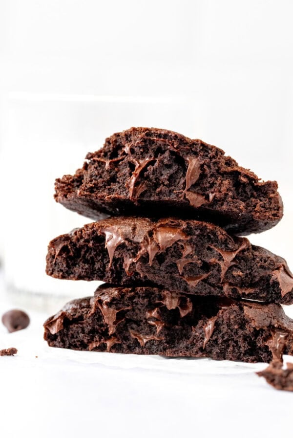 double chocolate cookies broken in half and stacked on top of one another