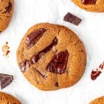 Coffee flavored cookies with chocolate chunks on baking paper
