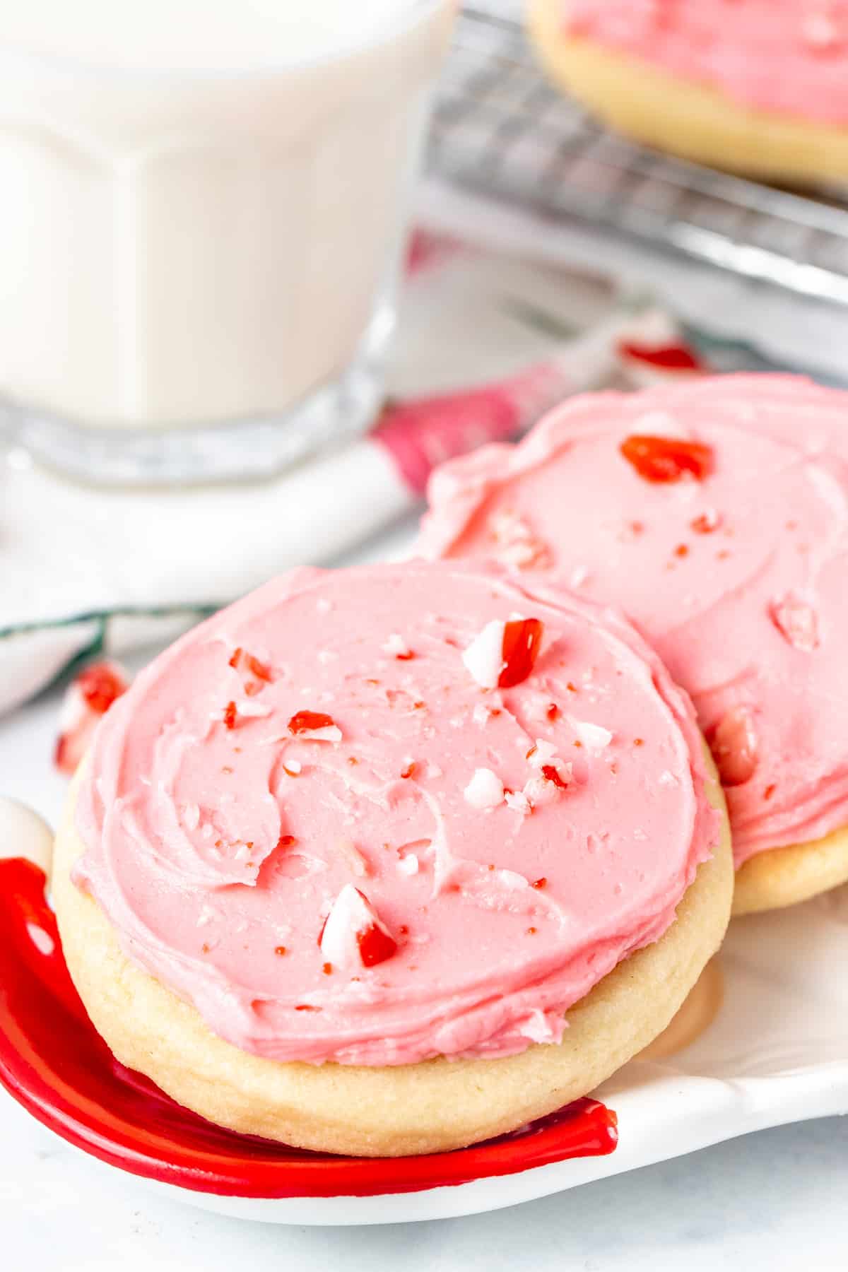Plate of peppermint sugar cookies with glass of milk