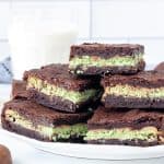 Plate of brownies with mint layer in the middle