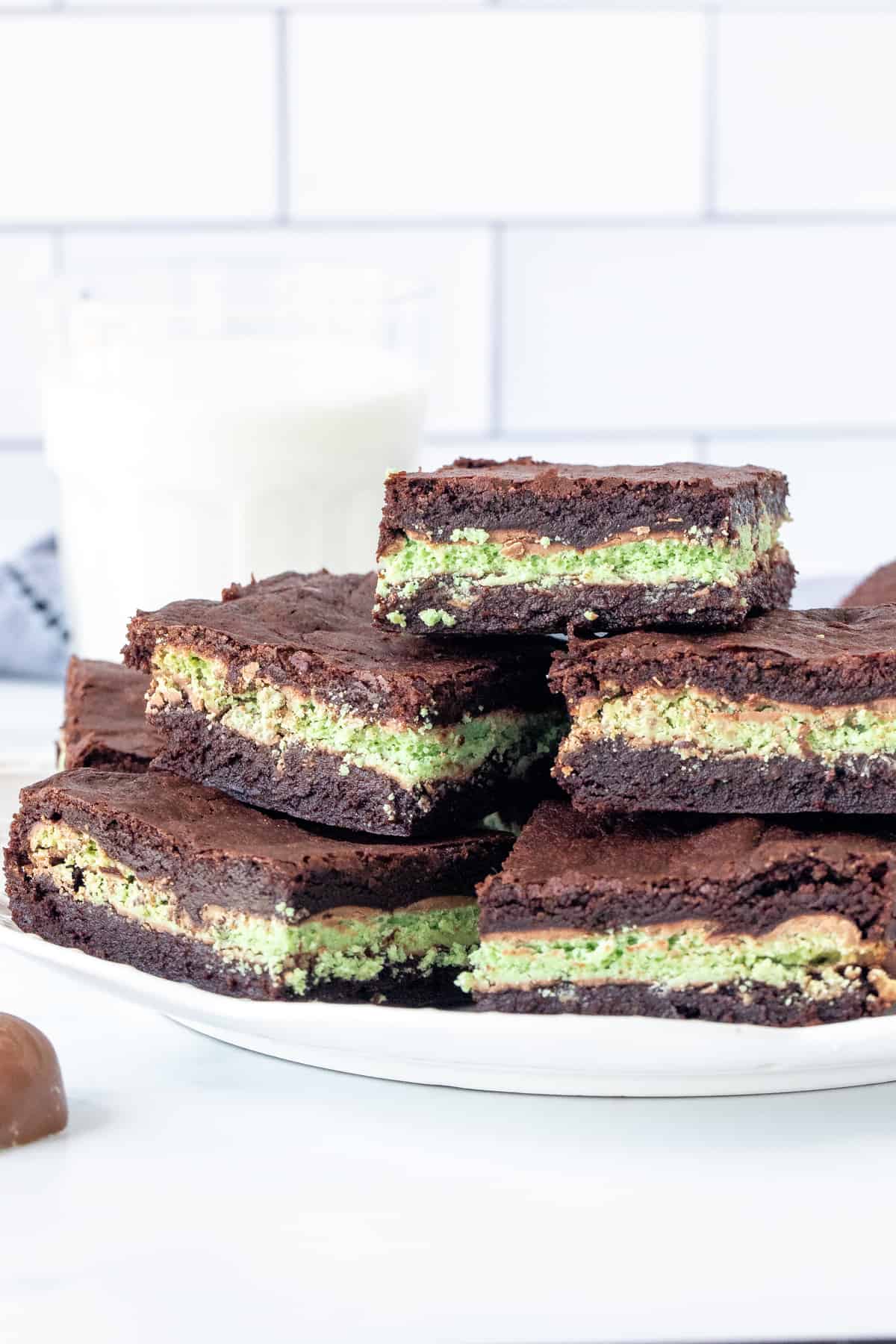 Plate of brownies with mint layer in the middle
