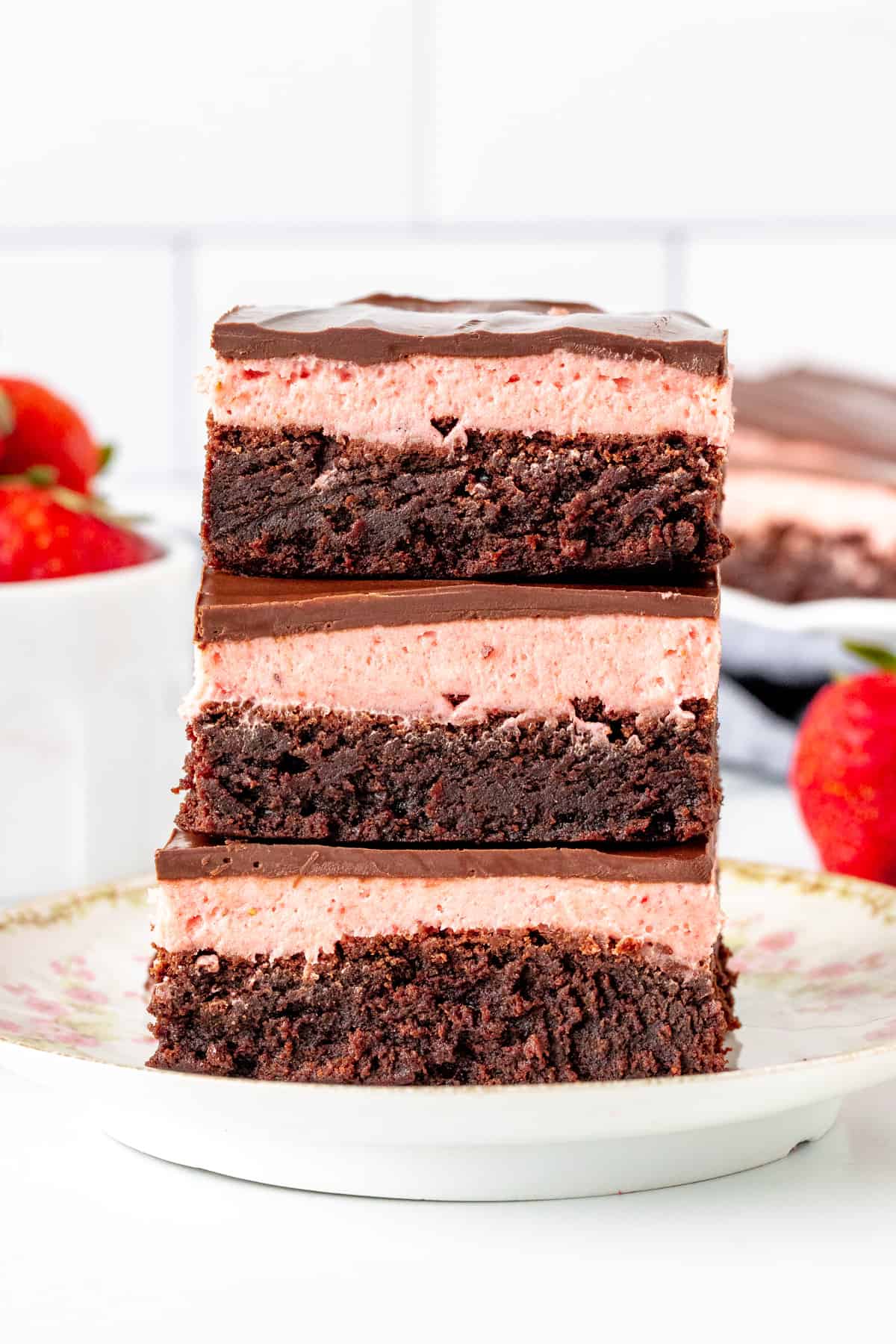 Stack of 3 strawberry truffle brownies.