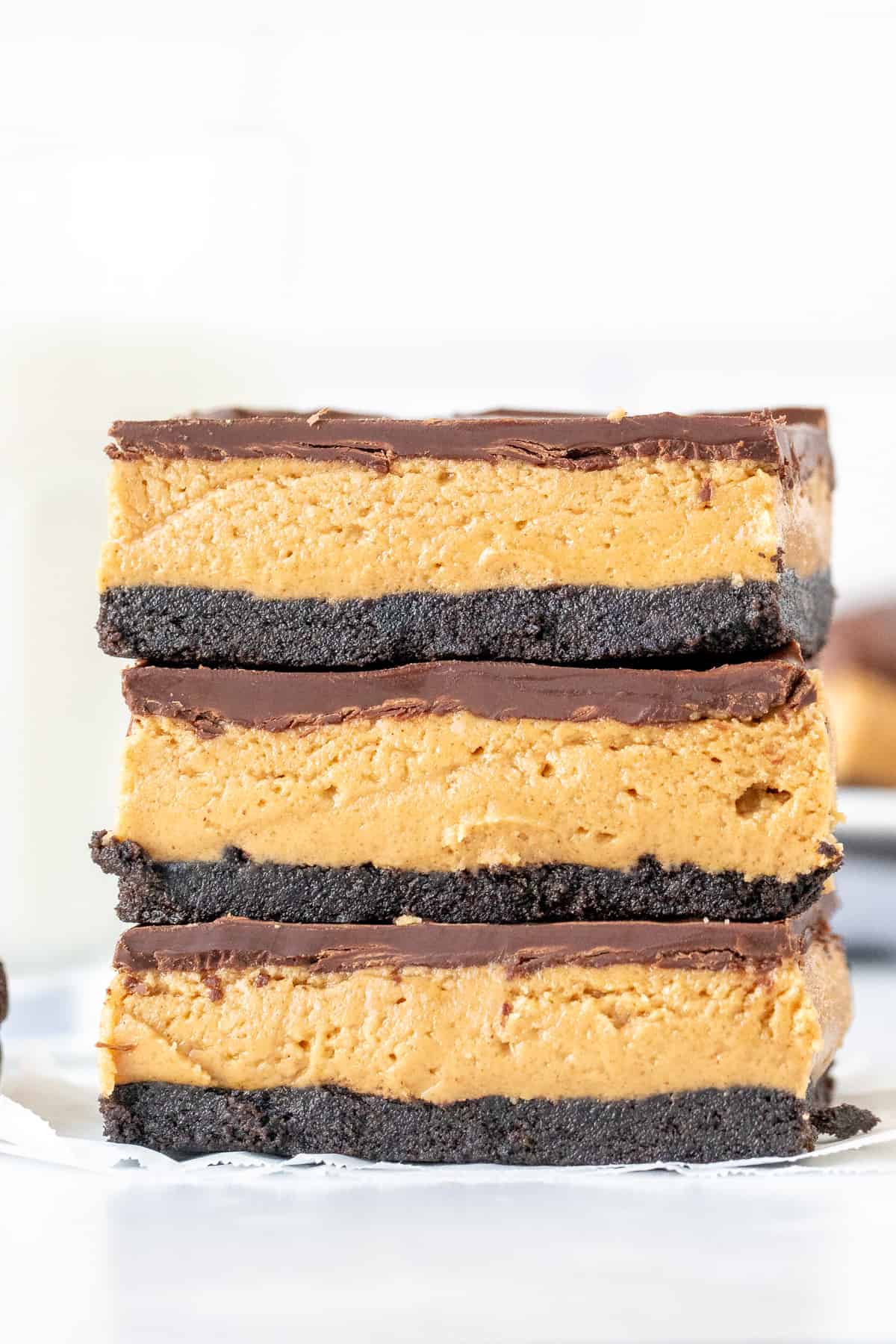 Stack of 3 peanut butter Oreo bars, one on top of each other.