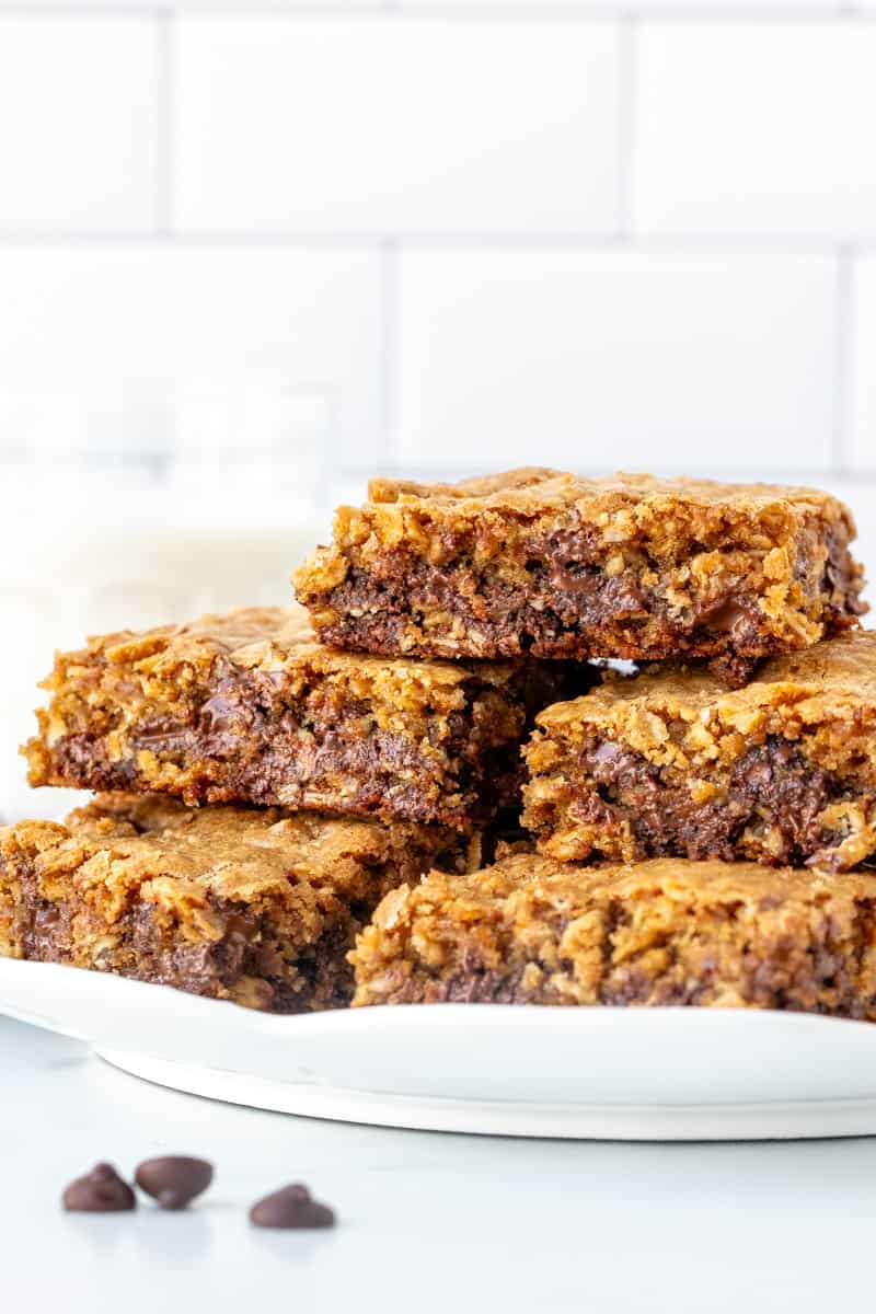 Plate of gooey oatmeal chocolate chip cookie bars