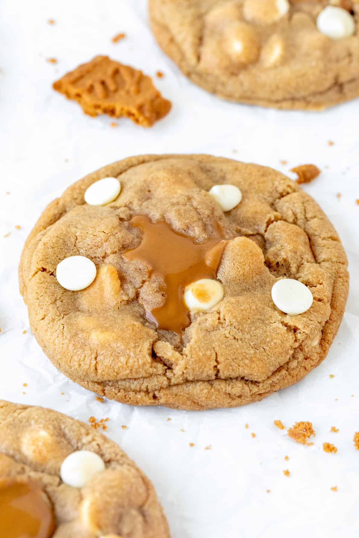 Biscoff stuffed cookie oozing with white chocolate chips and cookie butter in the middle