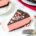 Slice of peppermint cheesecake with chocolate topping