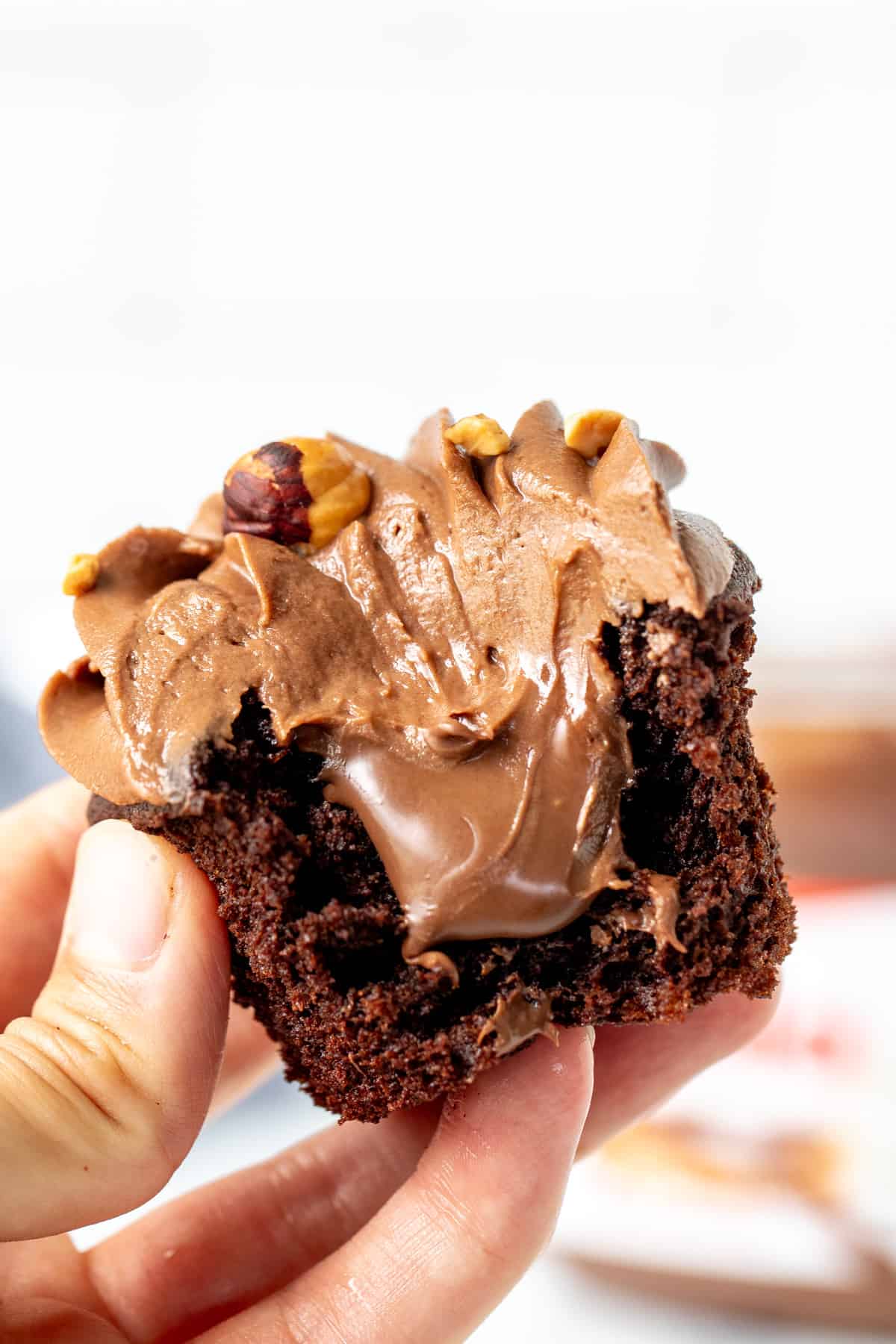 Nutella stuffed cupcake with a bite taken out