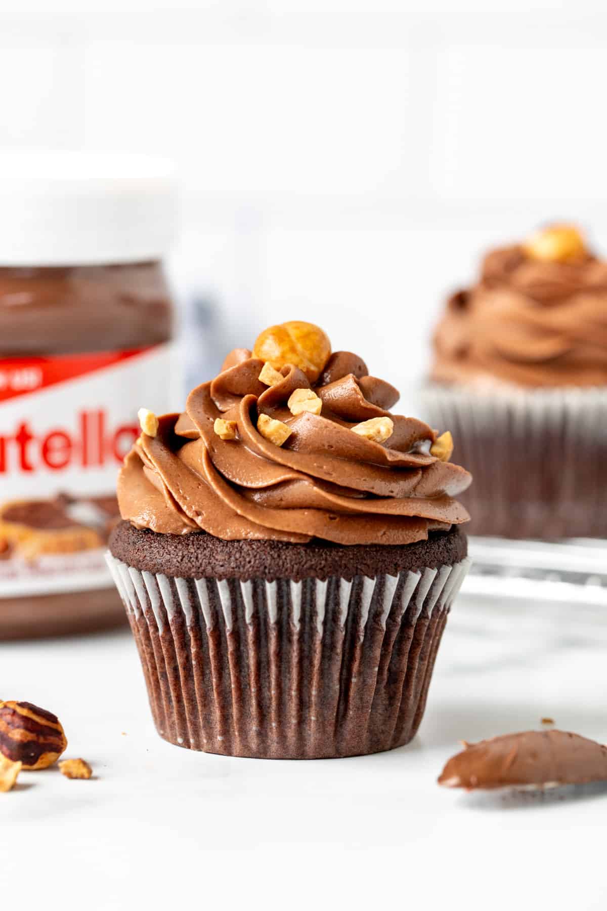 Nutella cupcake with Nutella frosting and jar of Nutella