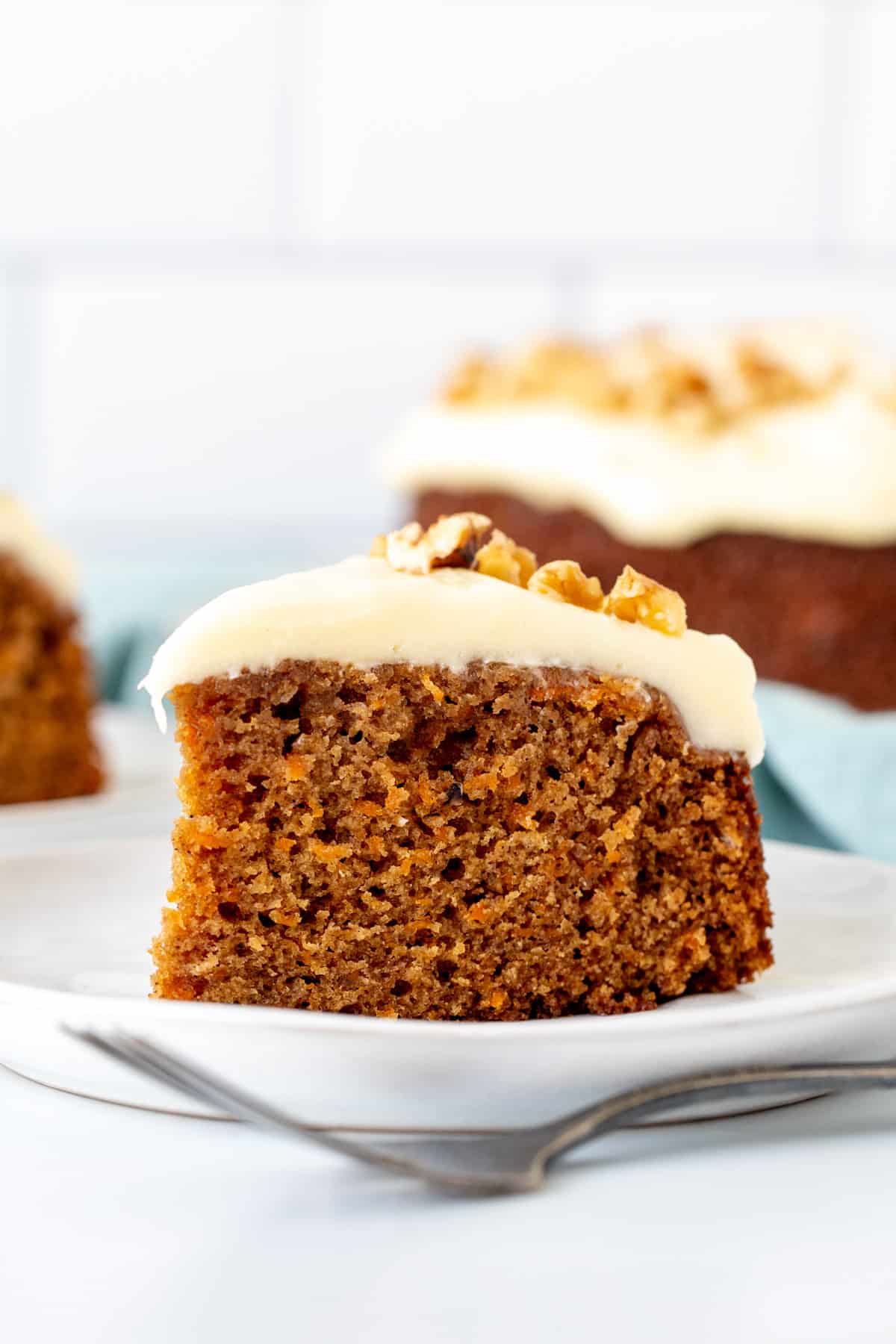 Slice of mini carrot cake with cream cheese frosting