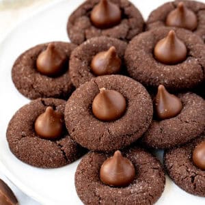 plate of chocolate cookies with Hershey's chocolate kiss on top