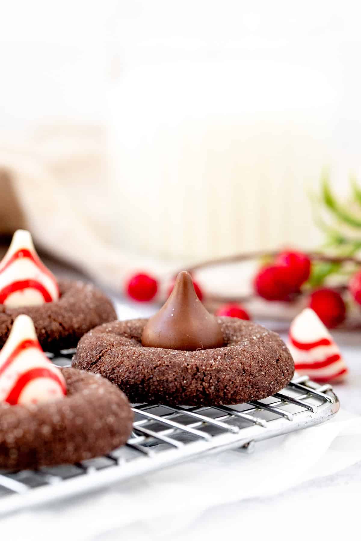 Chocolate blossom cookies and chocolate peppermint blossom cookies on a cooling rack